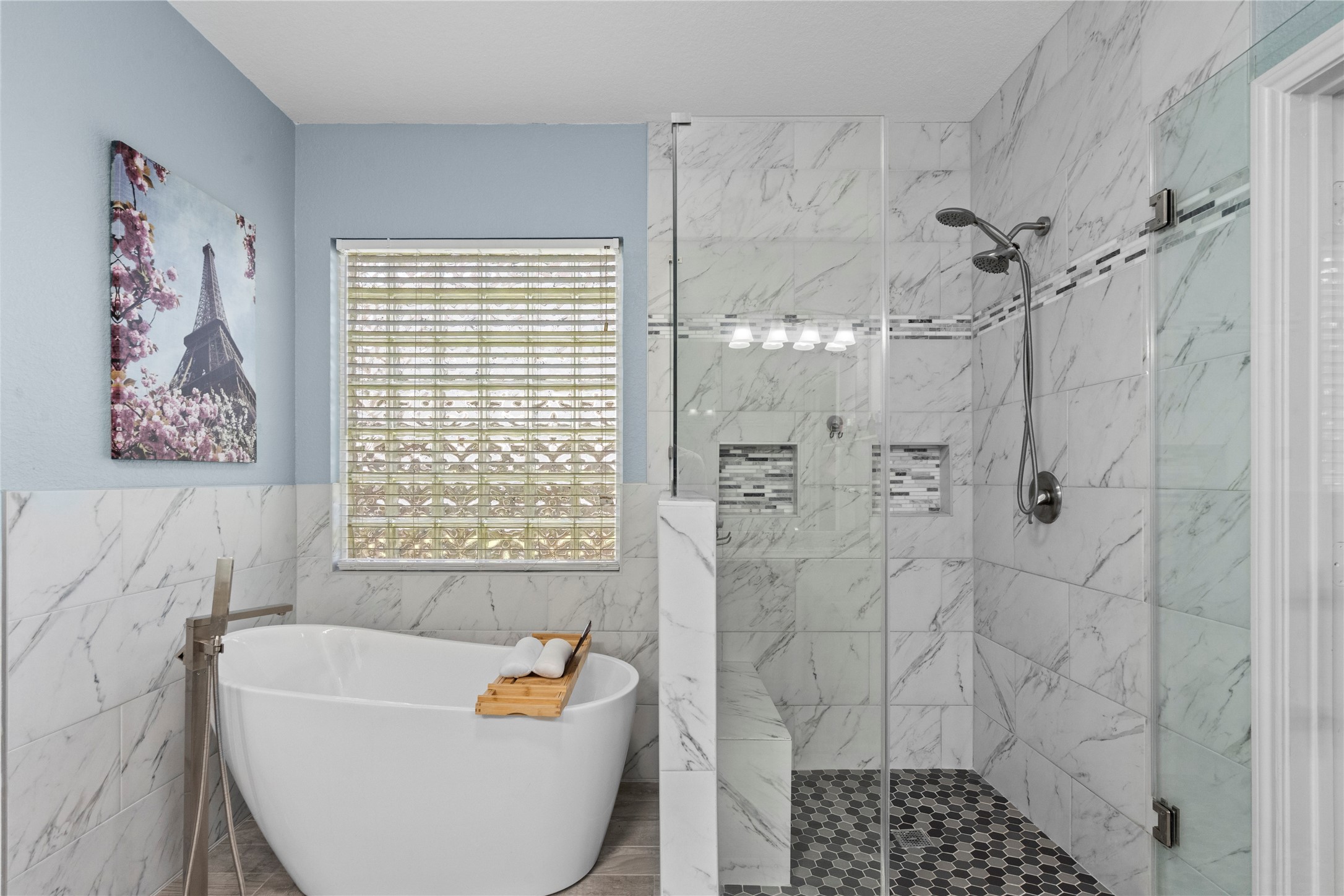 1011 Elm Pointe League City, TX 77573 - Photo 24 of 44 a bathroom with a bathtub and shower