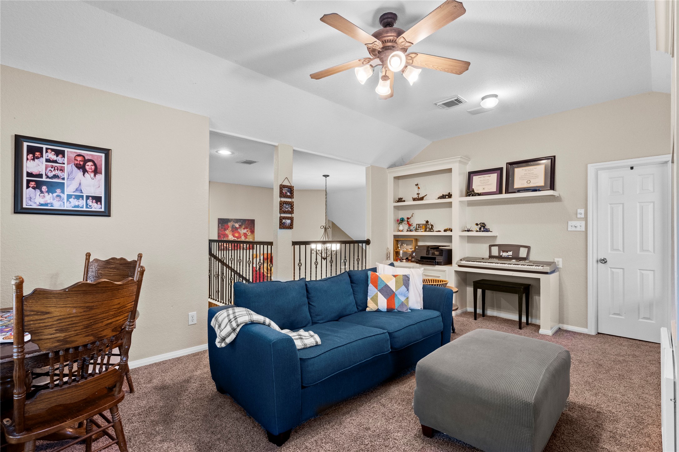 1011 Elm Pointe League City, TX 77573 - Photo 29 of 44 a living room with furniture and kitchen view