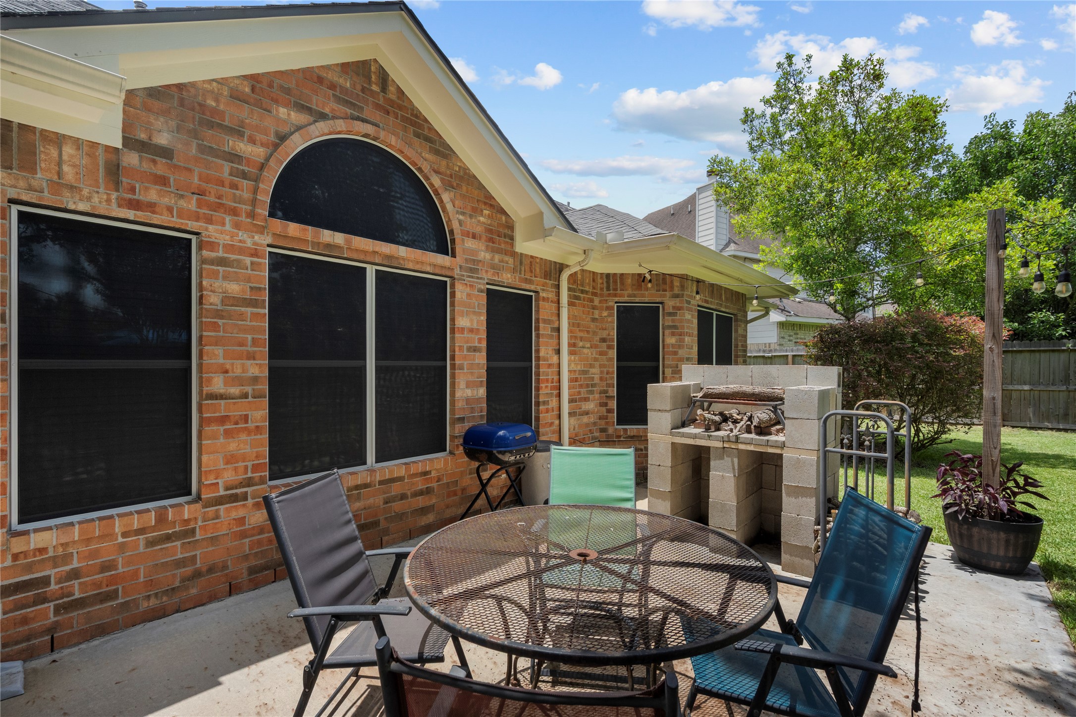 1011 Elm Pointe League City, TX 77573 - Photo 40 of 44 a view of house with backyard outdoor seating and green space