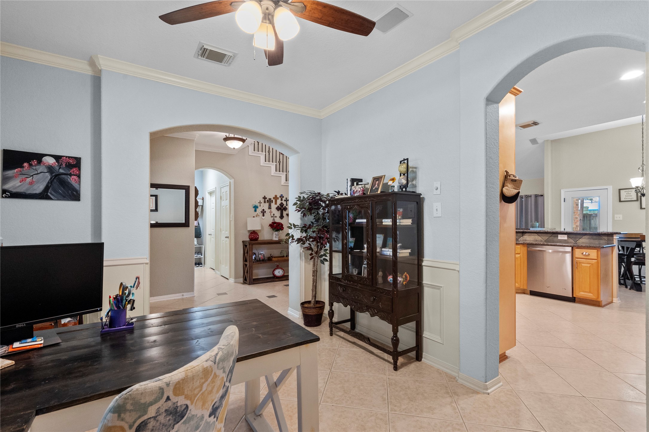 1011 Elm Pointe League City, TX 77573 - Photo 7 of 44 a view of a livingroom with workspace and a flat screen tv