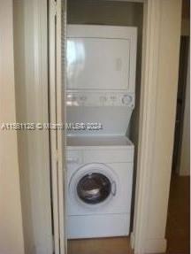 Silver Bluff Estates Miami, FL 33145 - Photo 11 of 13 a utility room with dryer and washer