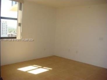 Silver Bluff Estates Miami, FL 33145 - Photo 6 of 13 a view of a small space with wooden floor and a window
