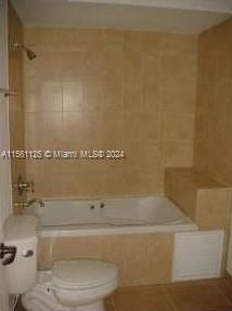 Silver Bluff Estates Miami, FL 33145 - Photo 9 of 13 a bathroom with a bathtub and a toilet