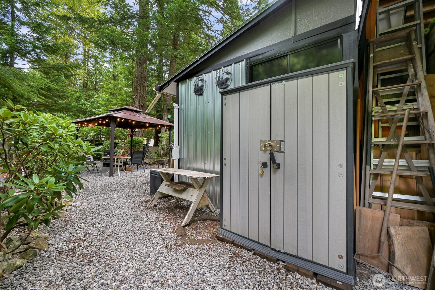 1010 Maple Lane Maple Falls, WA 98266 - Photo 24 of 40 a backyard of a house with table and chairs