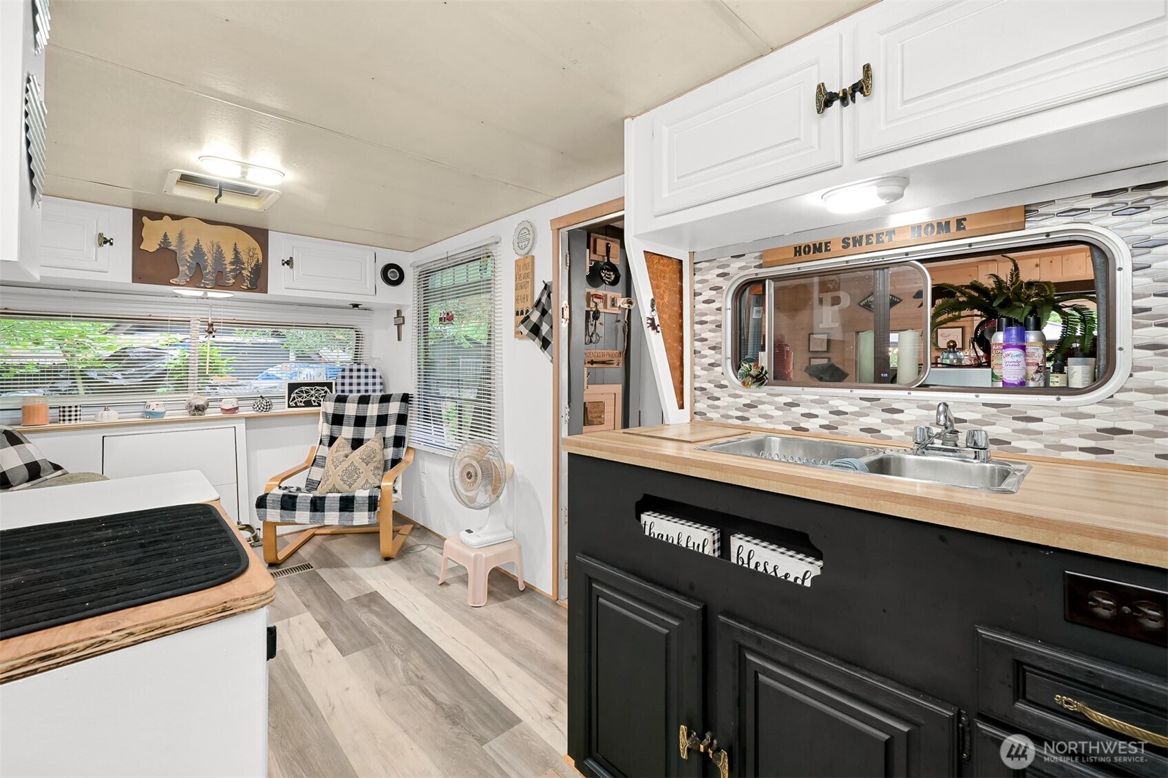1010 Maple Lane Maple Falls, WA 98266 - Photo 10 of 40 a kitchen with stainless steel appliances granite countertop a sink and stove