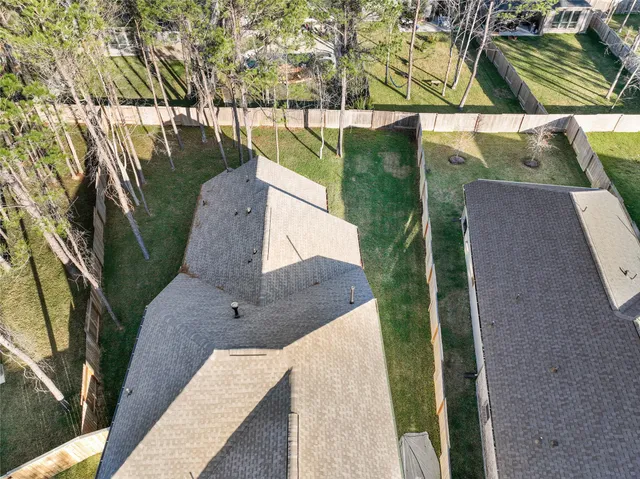 a view of swimming pool with a yard