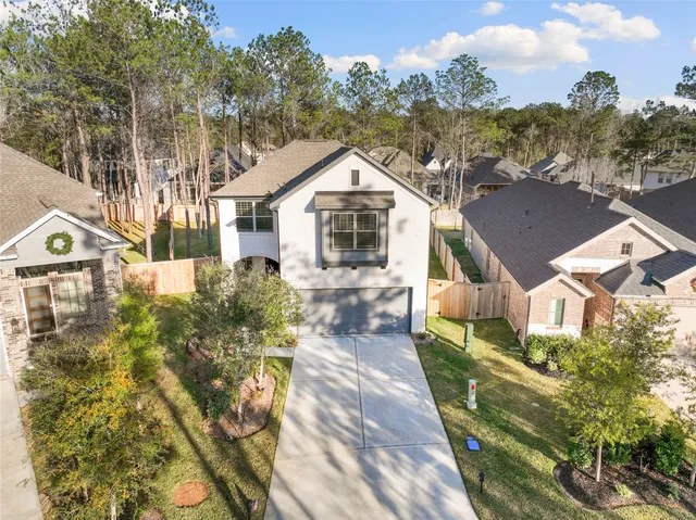 a house view with a garden space