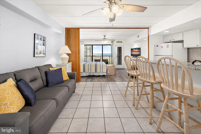 a kitchen with appliances a sink and cabinets