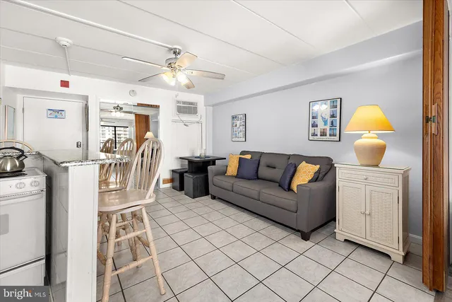 a view of entryway with kitchen and livingroom
