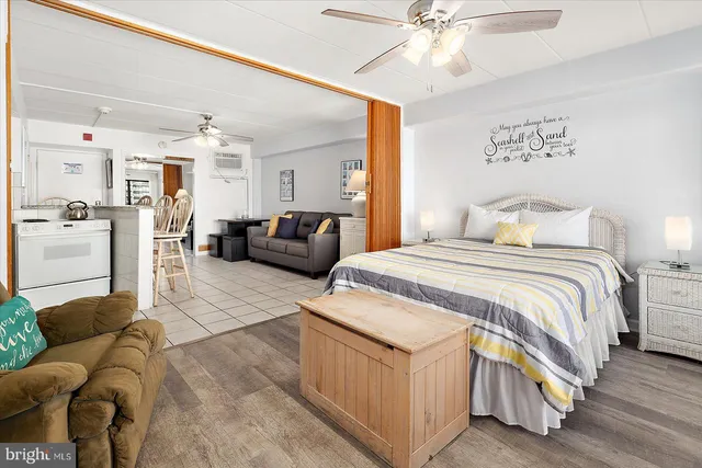 a bathroom with a sink and mirror with toilet