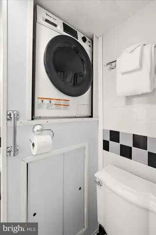 a bathroom with a shower and a shower curtain
