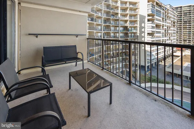 a view of balcony with furniture