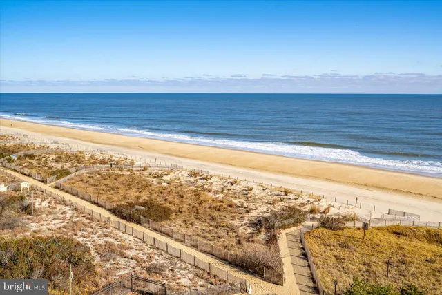 a view of swimming pool from a balcony