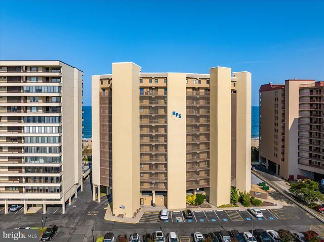 a front view of a building with glass windows