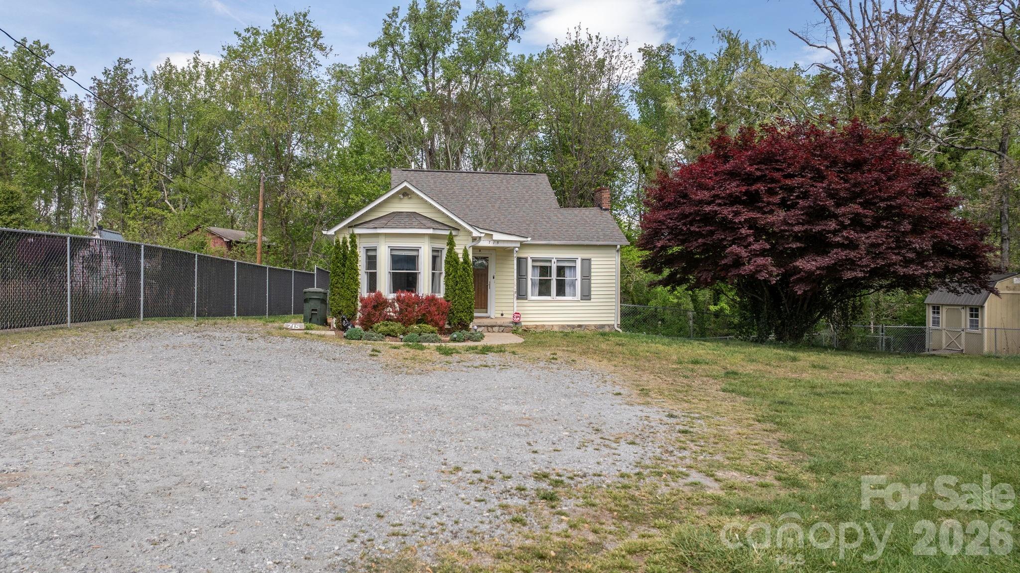 715 Main Street Hudson, NC 28638 - Photo 26 of 26 a view of a house with a yard and large tree
