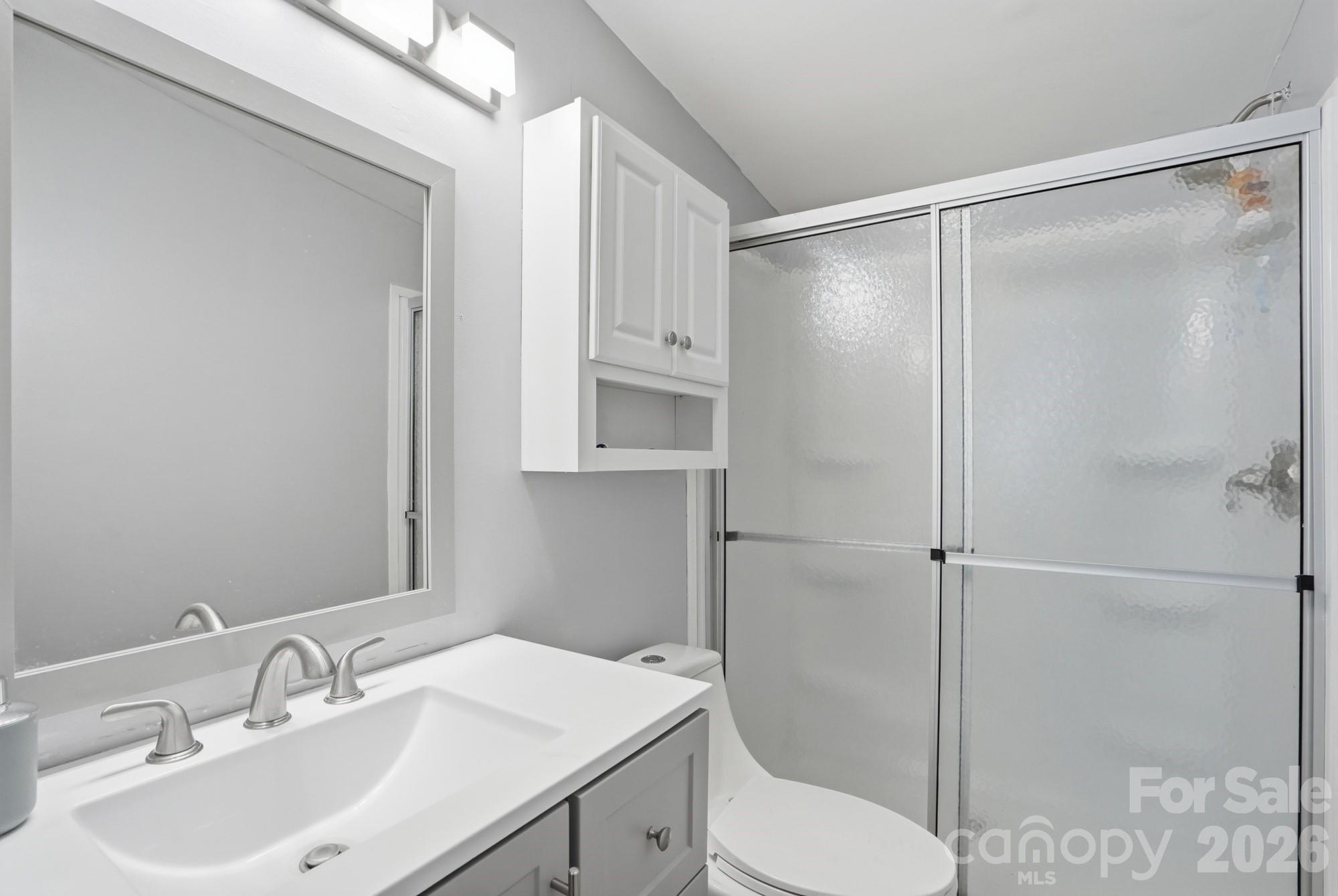 605 Ridgewood Court Mount Holly, NC 28120 - Photo 18 of 32 a bathroom with a sink toilet and shower