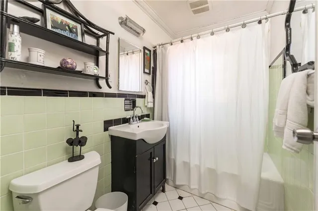 a view of a livingroom with furniture and a window
