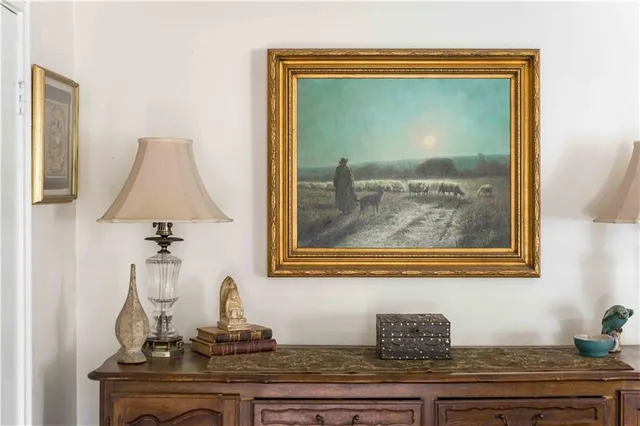 a workspace with furniture and a window