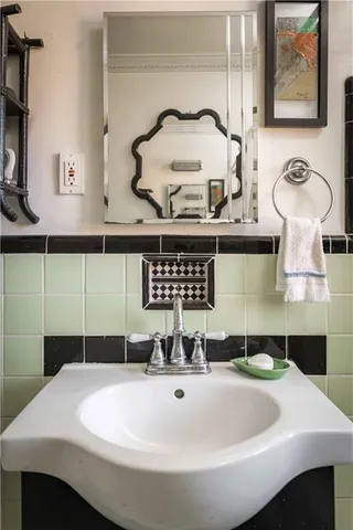 a kitchen with sink cabinets and window