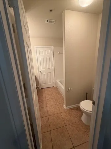 a bathroom with a sink and toilet