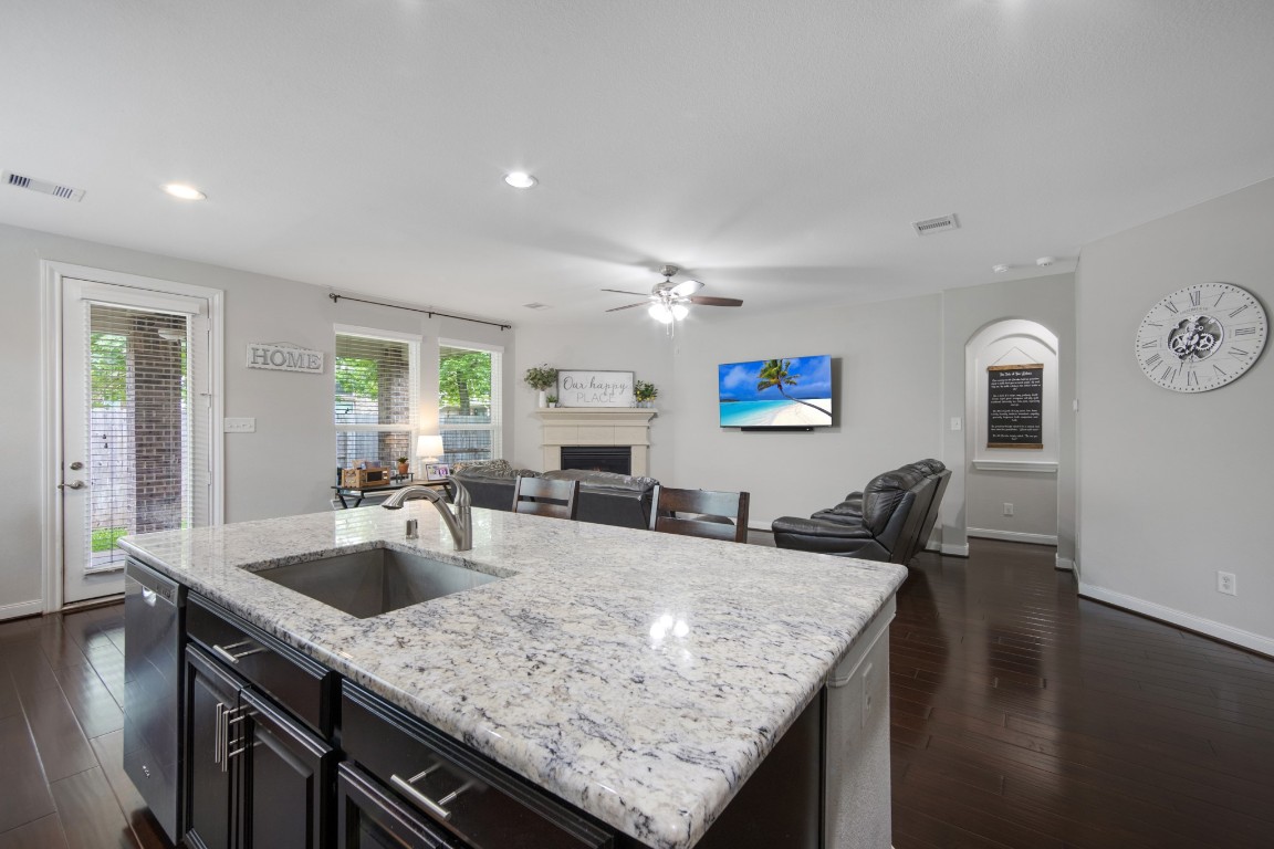 22622 Cutter Mill Drive Spring, TX 77389 - Photo 16 of 40 KITCHEN – SINK / LIVING ROOM VIEW
Kitchen overlooks the living area, allowing you to stay connected while hosting or spending time at home.