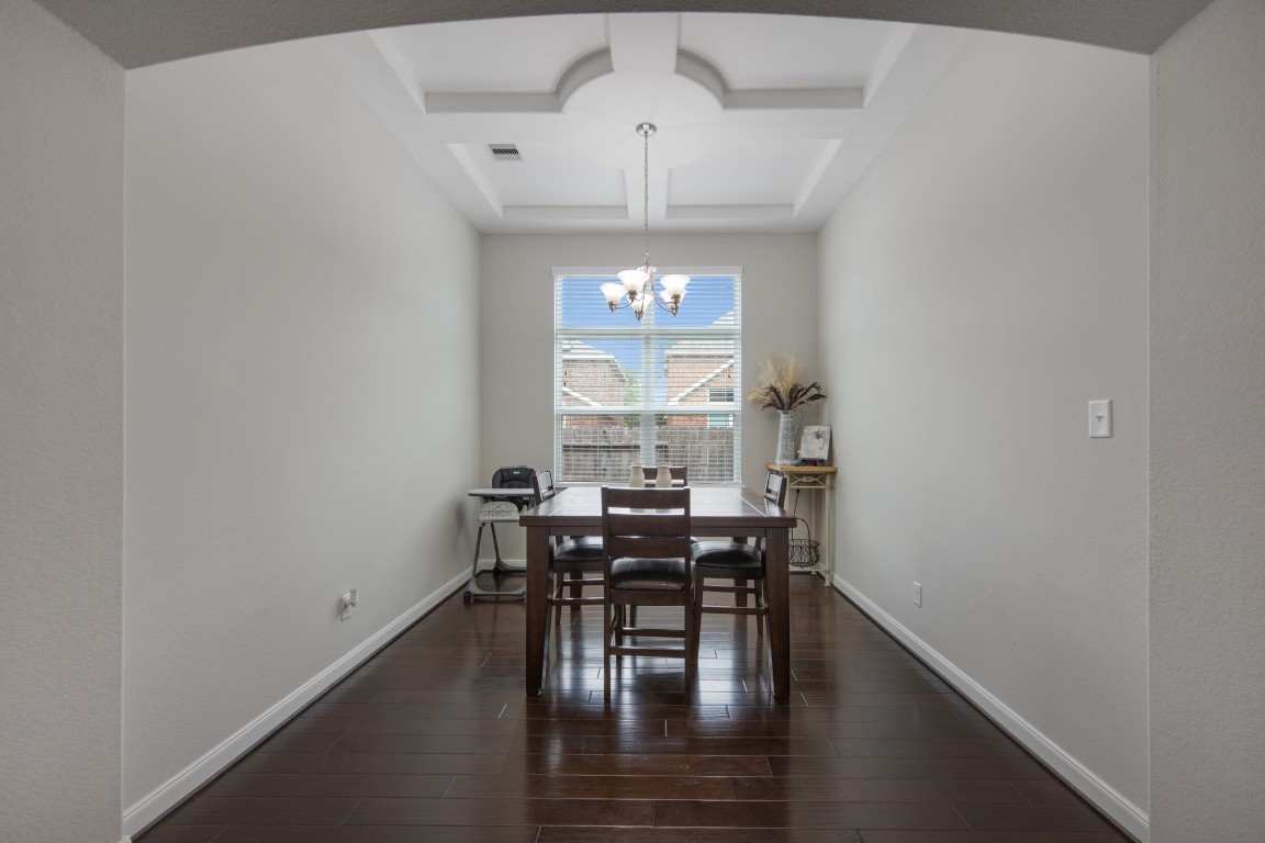 22622 Cutter Mill Drive Spring, TX 77389 - Photo 19 of 40 DINING ROOM – Gather, celebrate, and create memories in this elegant dining space, highlighted by a stunning tray ceiling that adds architectural charm and a sense of occasion.