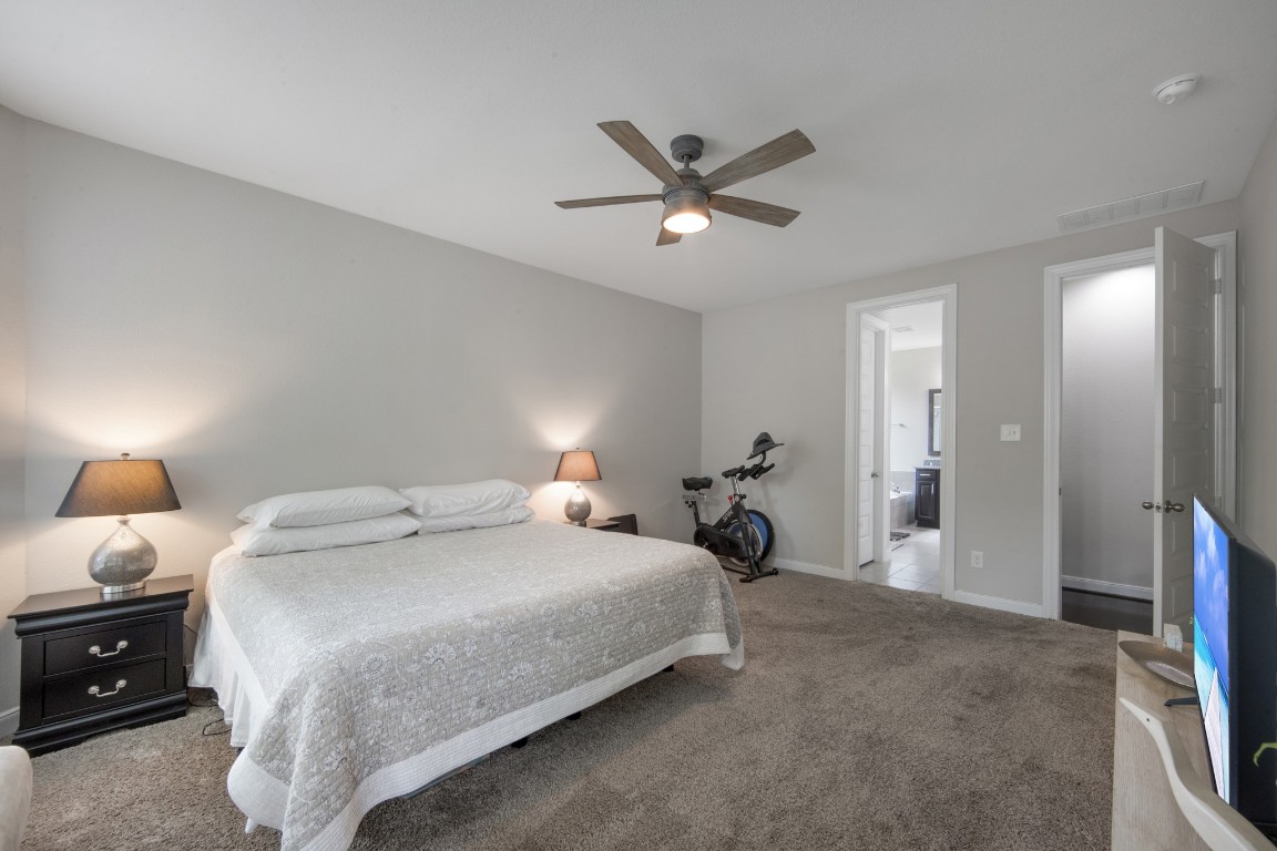 22622 Cutter Mill Drive Spring, TX 77389 - Photo 22 of 40 PRIMARY BEDROOM – ALTERNATE VIEW
Generous layout offers flexibility for additional seating, fitness space, or a personal lounge area.