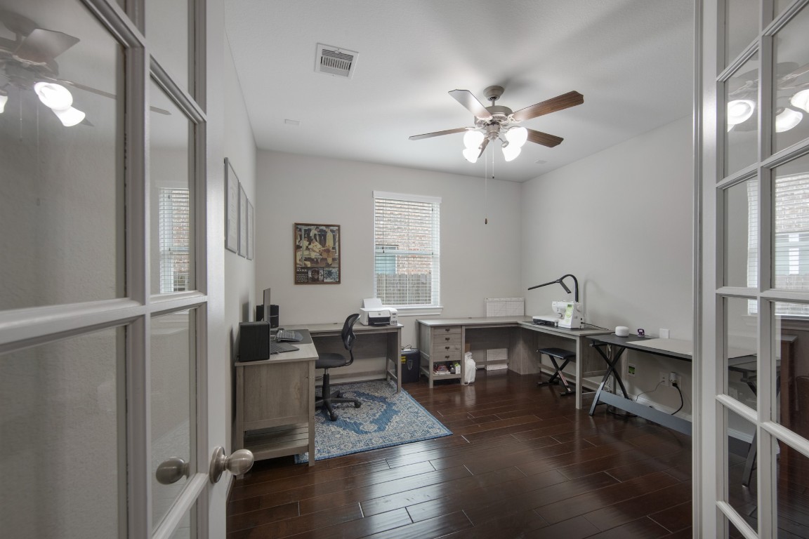22622 Cutter Mill Drive Spring, TX 77389 - Photo 26 of 40 STUDY / HOME OFFICE
Private home office with French doors offers a quiet, dedicated workspace—ideal for working from home or a flexible bonus room.
