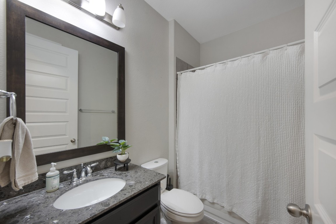 22622 Cutter Mill Drive Spring, TX 77389 - Photo 30 of 40 SECONDARY BATHROOM – Clean, fresh, and thoughtfully designed—this full bath offers a calm, neutral space ready for guests or everyday use with ease.