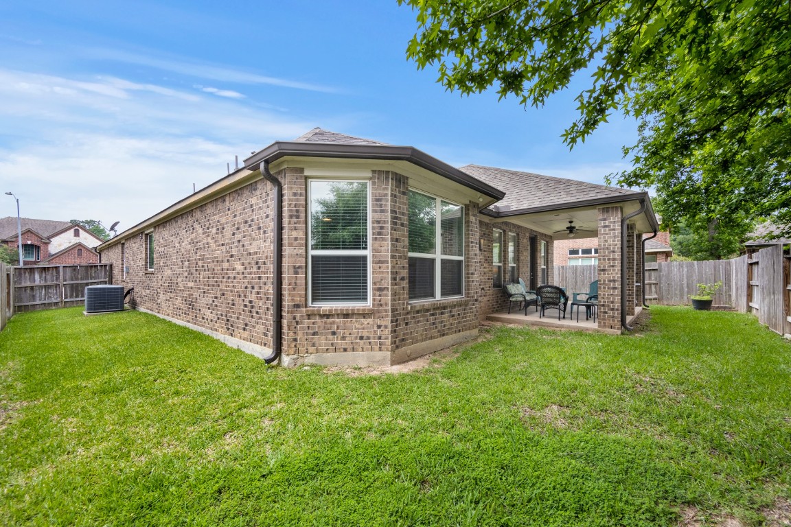 22622 Cutter Mill Drive Spring, TX 77389 - Photo 32 of 40 BACKYARD – Step outside to a backyard designed for simplicity and enjoyment—room to relax, play, or entertain without the burden of heavy maintenance.