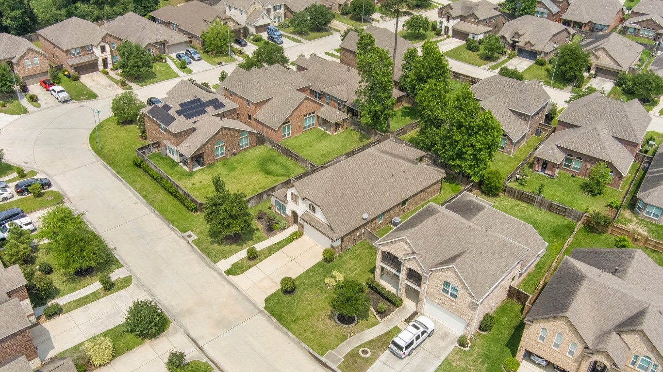 22622 Cutter Mill Drive Spring, TX 77389 - Photo 39 of 40 FRONT EXTERIOR (ANGLE) – A closer look reveals timeless curb appeal with architectural detail and a welcoming presence that stands out from the rest.