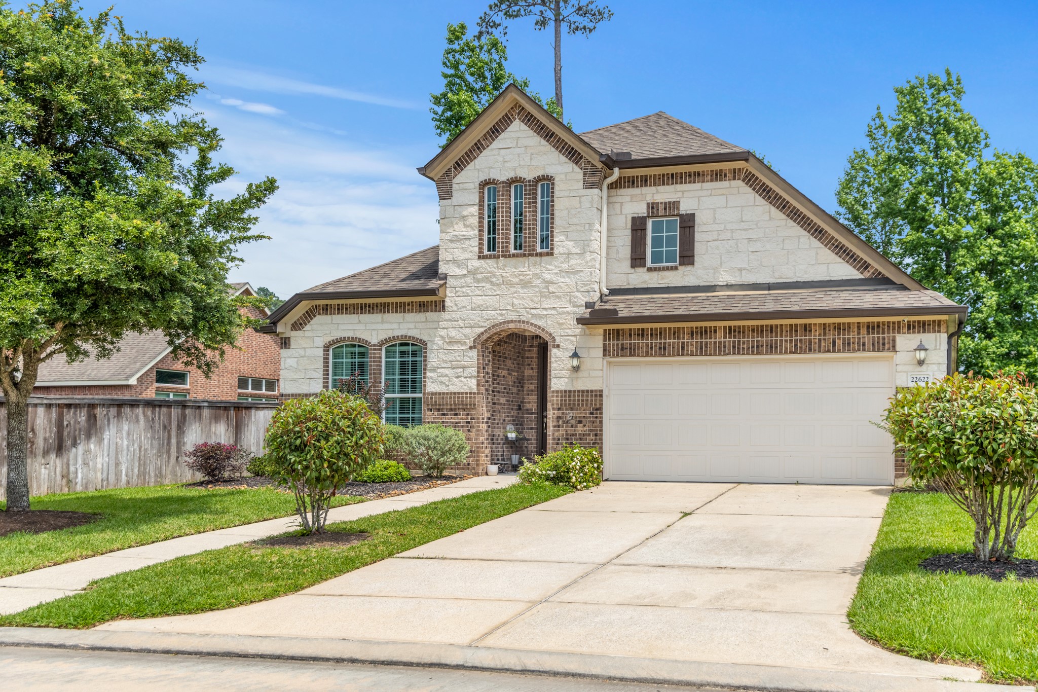 22622 Cutter Mill Drive Spring, TX 77389 - Photo 4 of 40 FRONT (STRAIGHT-ON)
Classic stone and brick elevation with timeless curb appeal and a clean, well-kept presentation that stands out in the neighborhood.