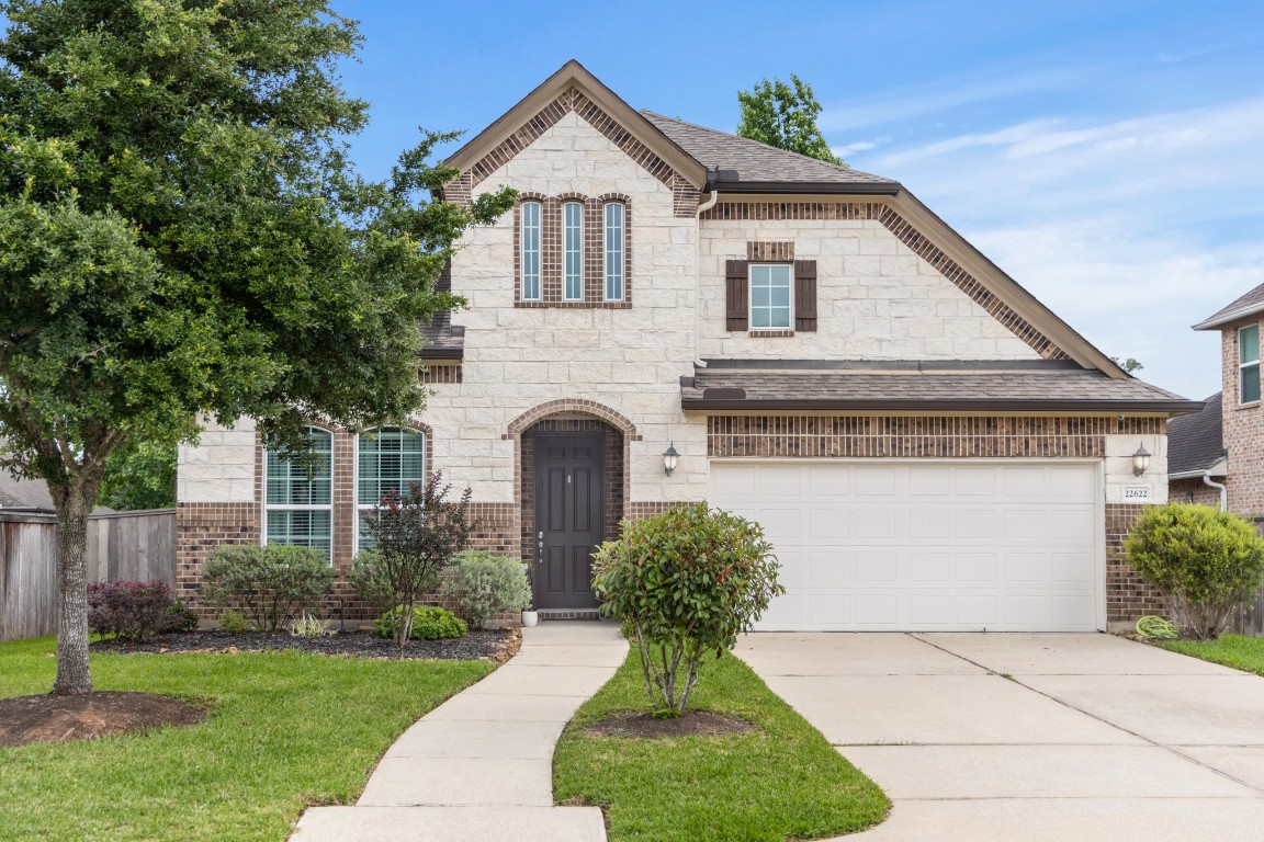 22622 Cutter Mill Drive Spring, TX 77389 - Photo 6 of 40 FRONT (SECOND ANGLE)
Positioned on a quiet street, this home offers both privacy and presence with a well-balanced exterior and attractive lot placement.