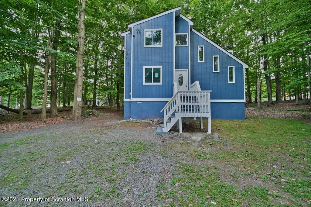 978 Goose Pond Road Lake Ariel, PA 18436 - Photo 1 of 44 a front view of a house with a yard