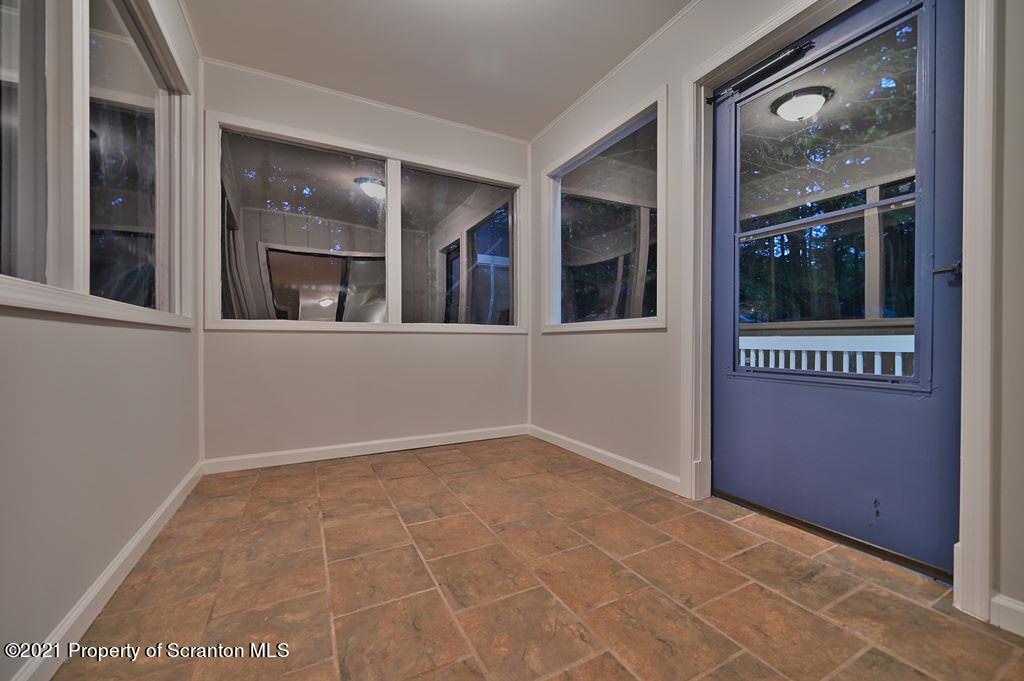 978 Goose Pond Road Lake Ariel, PA 18436 - Photo 13 of 44 a view of an empty room with a window