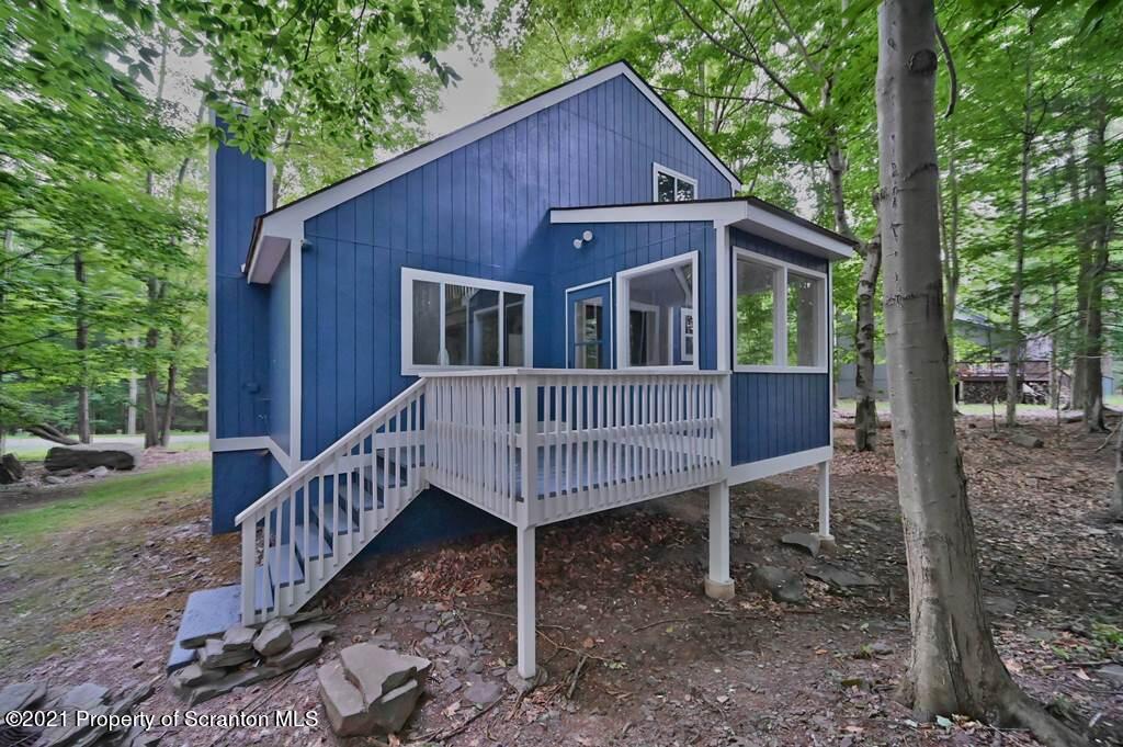 978 Goose Pond Road Lake Ariel, PA 18436 - Photo 2 of 44 a view of a house with a yard and deck