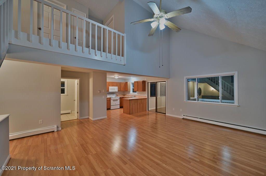 978 Goose Pond Road Lake Ariel, PA 18436 - Photo 3 of 44 wooden floor in an empty room with a window