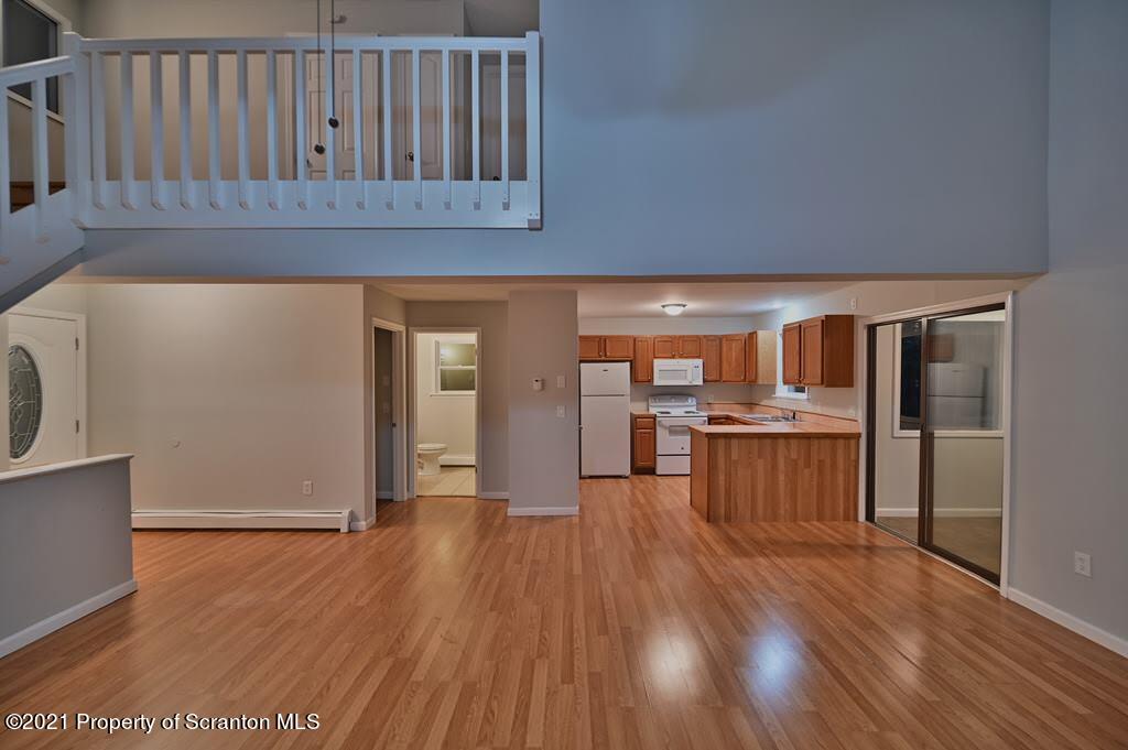978 Goose Pond Road Lake Ariel, PA 18436 - Photo 4 of 44 a view of a room with wooden floor