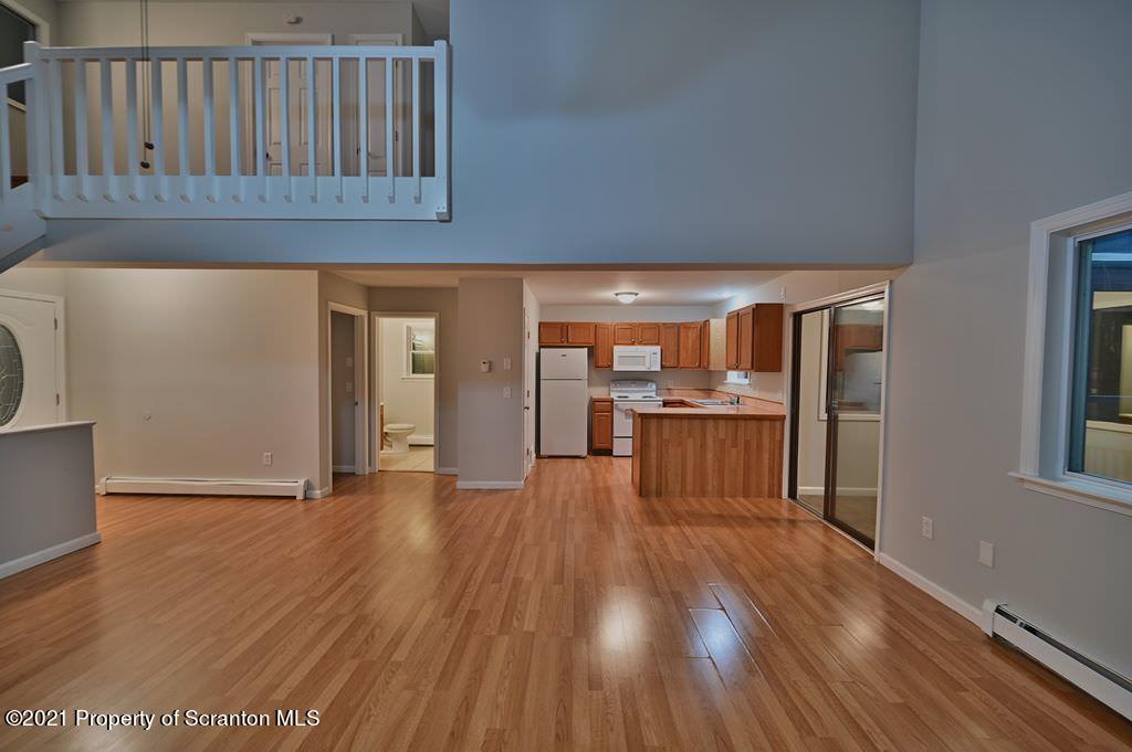 978 Goose Pond Road Lake Ariel, PA 18436 - Photo 10 of 44 a view of a hallway with wooden floor