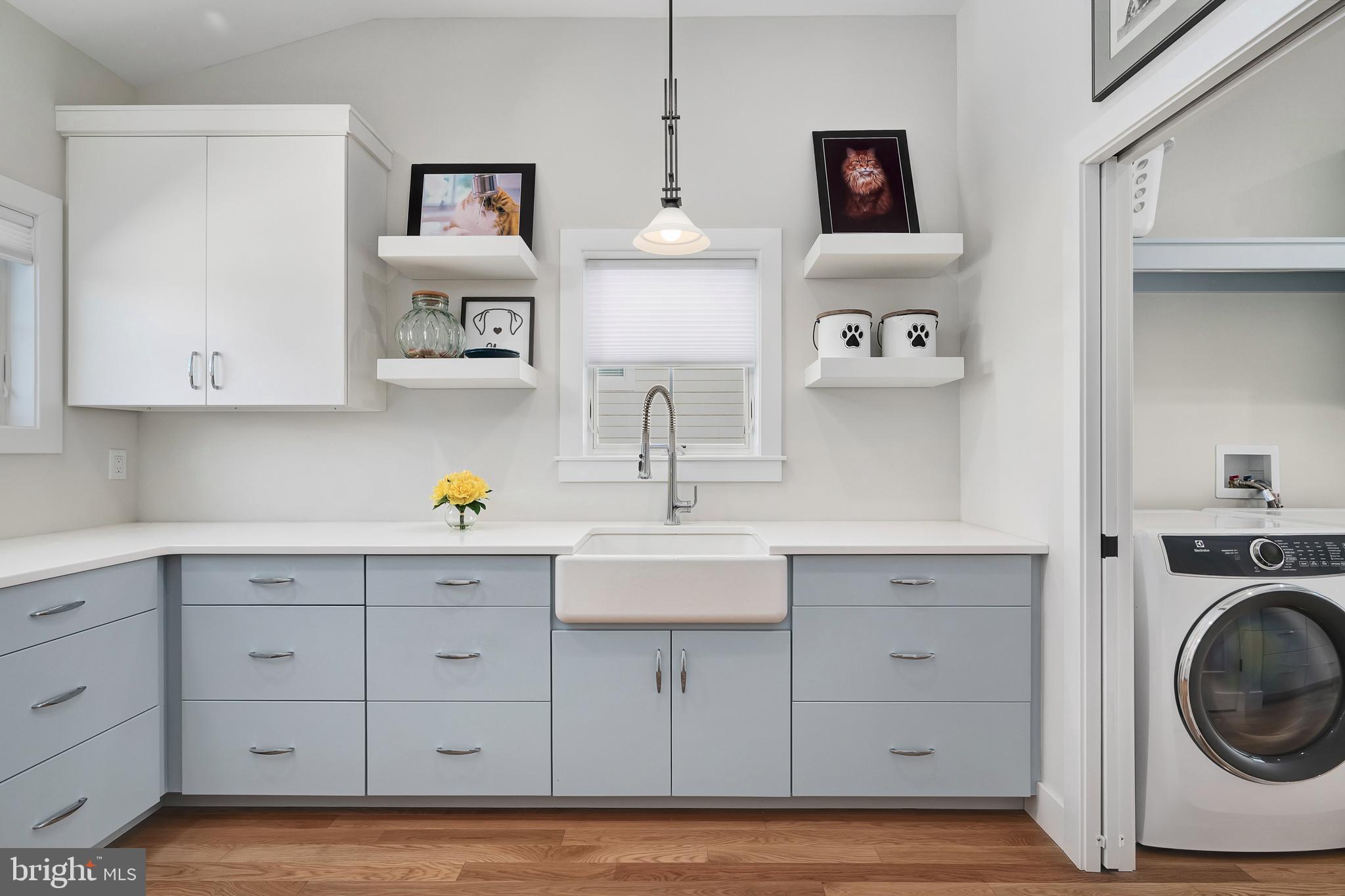 29 Amherst Road Long Beach Township, NJ 08006 - Photo 14 of 56 a kitchen with sink cabinets and utility