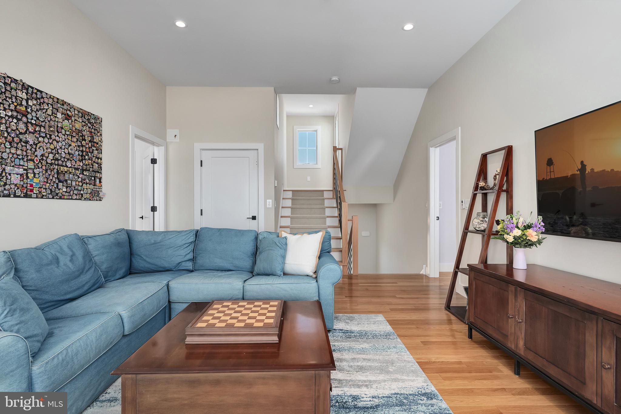 29 Amherst Road Long Beach Township, NJ 08006 - Photo 38 of 56 a living room with furniture and a flat screen tv