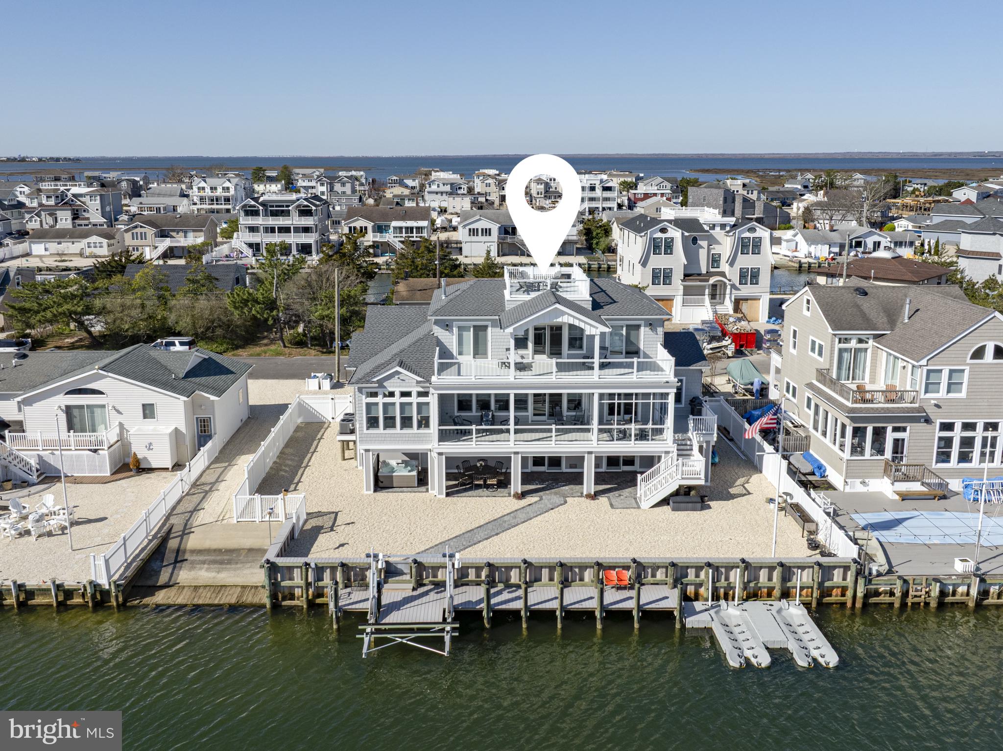 29 Amherst Road Long Beach Township, NJ 08006 - Photo 54 of 56 an aerial view of a house with a swimming pool