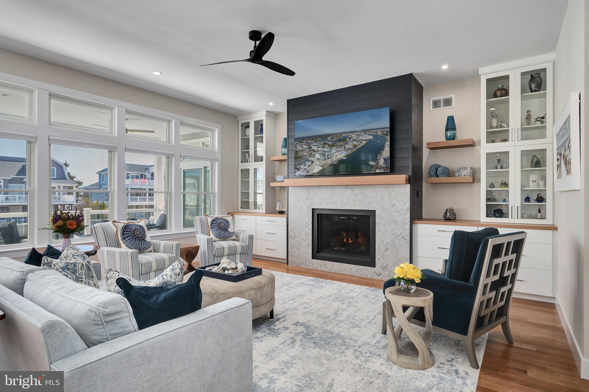 29 Amherst Road Long Beach Township, NJ 08006 - Photo 9 of 56 a living room with furniture and a fireplace