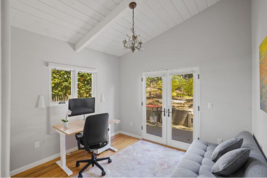 Junipero Street Carmel, CA 93921 - Photo 17 of 33 a view of a livingroom with workspace and a window