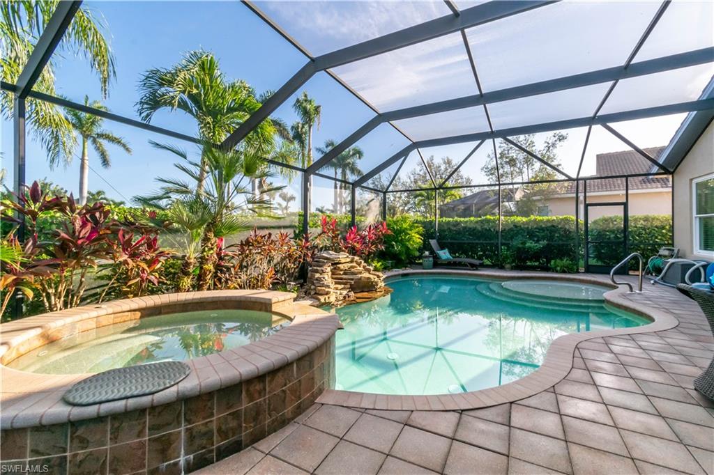 19912 Maddelena Circle Estero, FL 33967 - Photo 2 of 20 a view of swimming pool with a patio