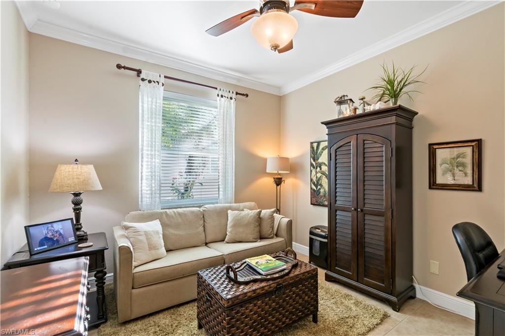 19912 Maddelena Circle Estero, FL 33967 - Photo 9 of 20 a living room with furniture and a window