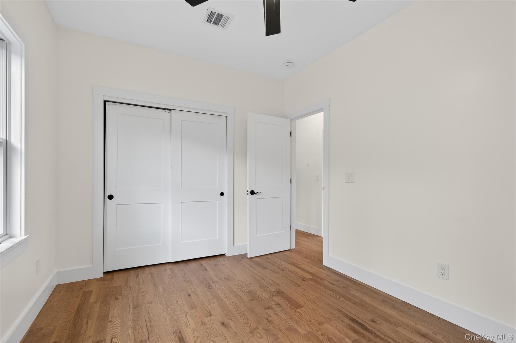 129 Nelson Road Hankins, NY 12741 - Photo 19 of 31 a view of an empty room with wooden floor