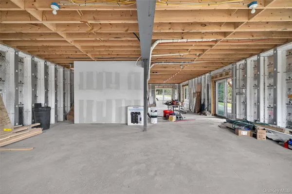 a view of a room with wooden walls