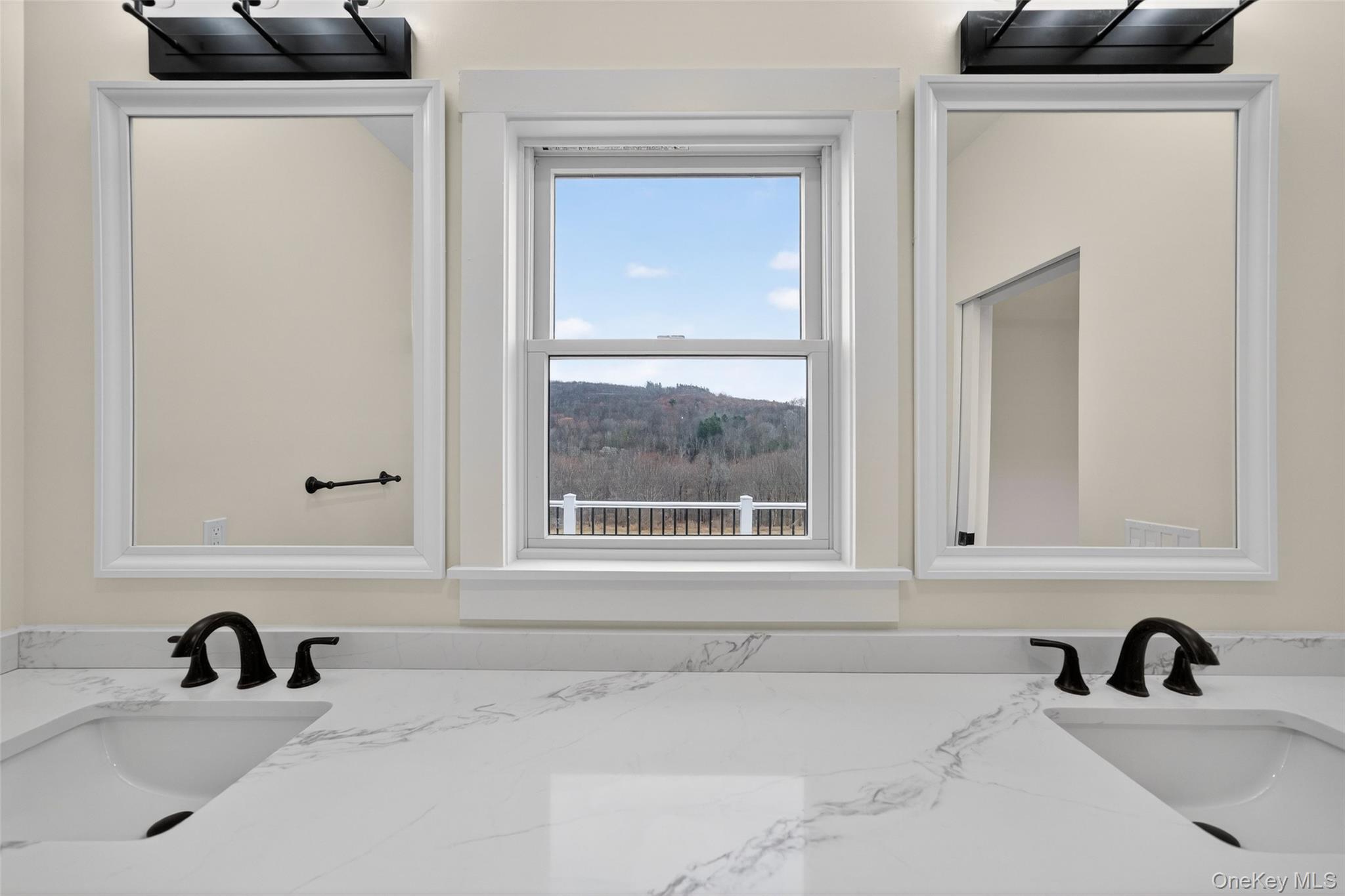 129 Nelson Road Hankins, NY 12741 - Photo 9 of 31 a bathroom with a sink and a window