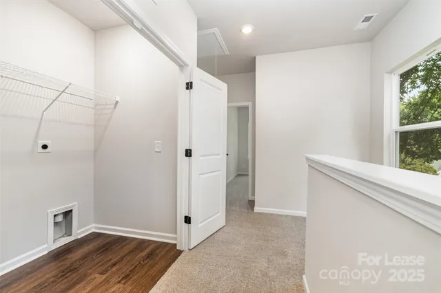 a view of livingroom with hardwood floor and window